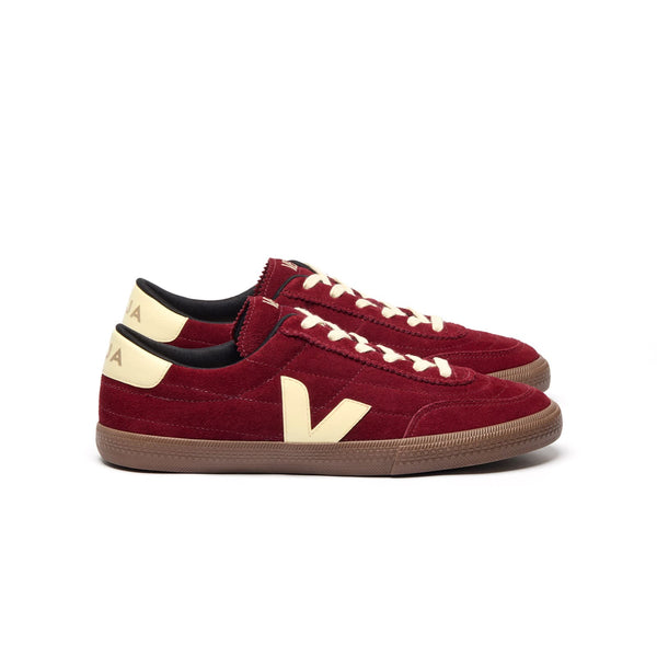 Side view of sustainable VEJA Panenka suede sneakers in grenat red with sun and bark details
