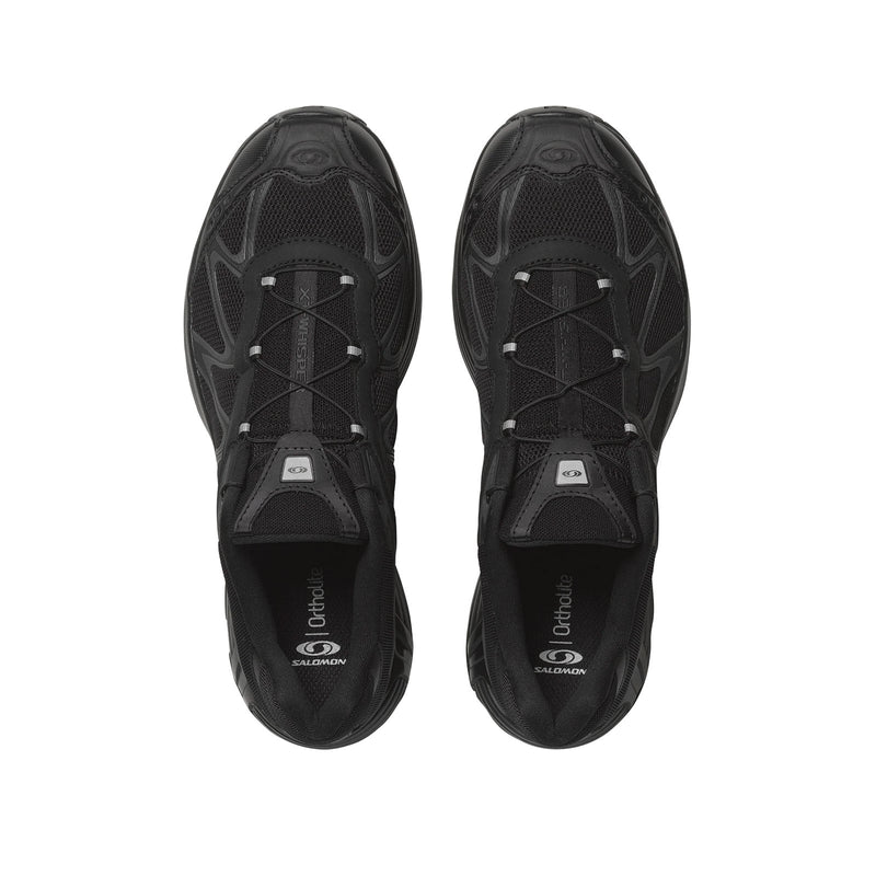 XT-WHISPER noire, système de laçage Quicklace et détails outdoor subtils