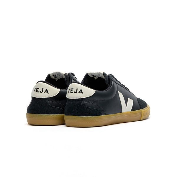 Back view of Veja Volley – black sustainable sneakers with heel logo and vintage court shoe design